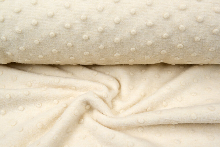 Boiled wool fluffy effen dots ecru-beige