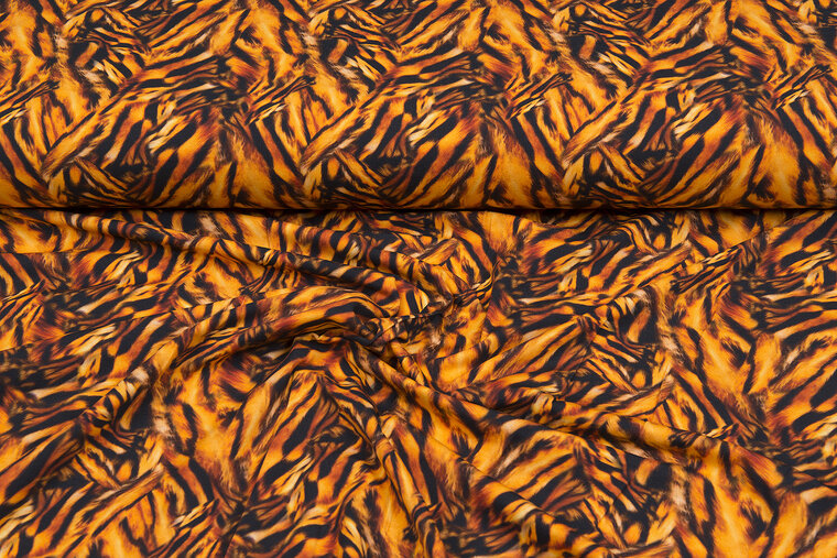 Katoenen Tricot bedrukt digitaal animal print zwart-oranje